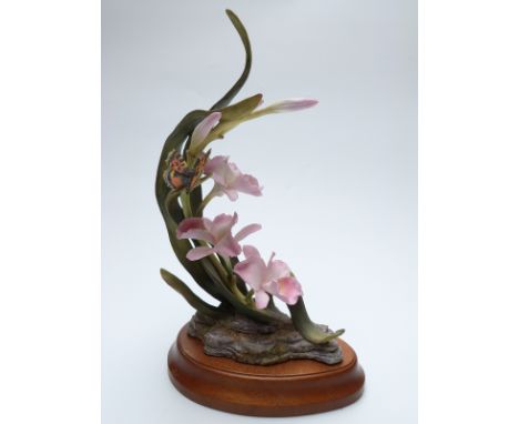 Royal Worcester Ornamental Studio Orchid with butterfly by David Fryer, with plinth, 41cm tall