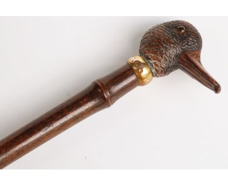 Late 19thC parasol with carved figural duck handle, yellow metal collar impressed 'Brigg', bamboo stick and brass spike, 90cm