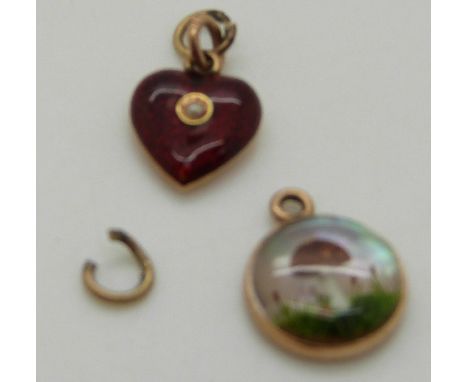 A Victorian intaglio pendant depicting a mushroom and a red guilloché enamel heart pendant set with a central pearl, 2.88g