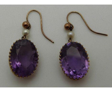 A pair of late Victorian / early Edwardian earrings set with amethyst and a pearl, each amethyst approx 7ct, 5.28g