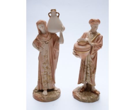 Royal Worcester pair of blush ivory water carrier figures, shape nos 1250 &1252, tallest 25cm