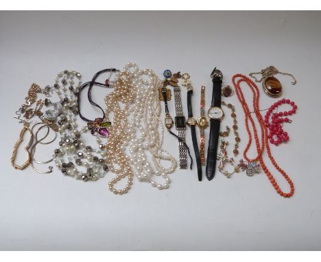 A collection of costume jewellery including mother-of-pearl brooch, Swarovski necklace, coral necklace, mico-mosaic bracelet,