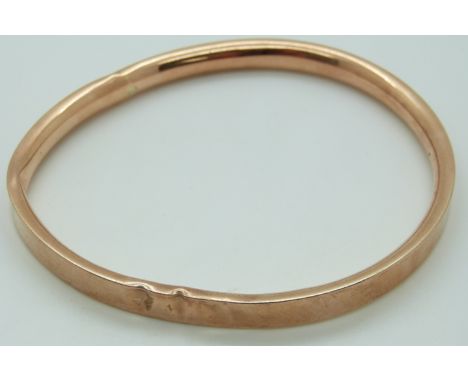 A 9ct rose gold flapper bangle, 13.4g