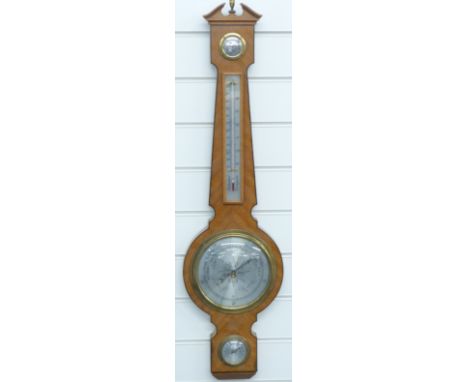 A 20thC aneroid barometer in Edwardian style by O Comitti & Son, silvered dial, with points of the compress centre blue steel