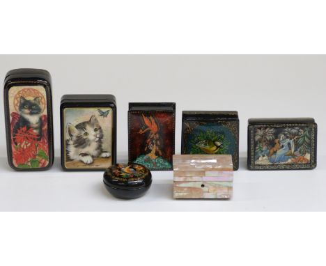 Six Russian lacquer boxes, some signed and a mother of pearl trinket box, length of longest 11cm 