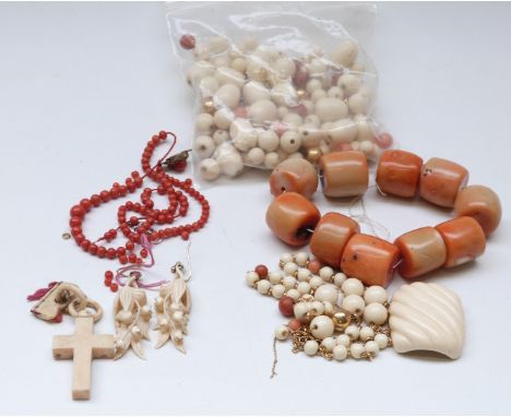 A pair of 19th/early 20thC carved ivory earrings, a bone cross, a faux ivory and coral necklace and a coral necklace made up 
