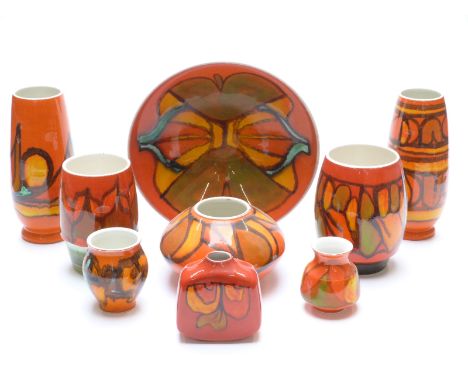 Nine Poole Pottery Delphis pattern vases, tallest 22cm