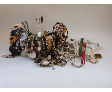 A collection of jewellery including agate and pearl necklaces, beaded necklaces, brooches, watches, earrings etc