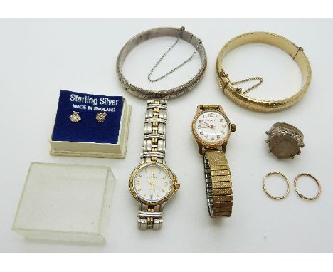 A silver bangle, gold plated bangle, two watches, silver coin, silver earrings and a pair of 9ct gold earrings