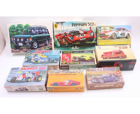 Nine boxed mixed scale and mixed manufacture plastic racing and vehicle kits to include an IMC Dodge Little Red Wagon, an Aos