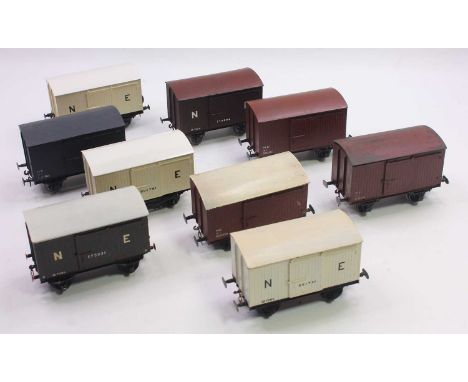 Nine Bassett-Lowke/ Leeds Model Co 4-wheel Bakelite goods vans, some have been fitted with finer scale wheels than the origin