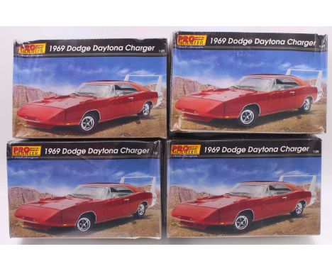 A collection of four ex-shop stock Pro Modeller, a 1969 Dodge Daytona Charger 1/25 scale plastic kits model Ref. No. 85-5946,