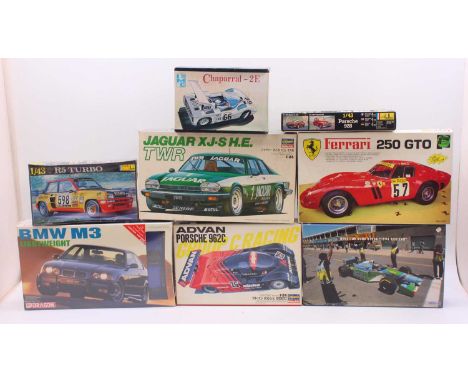 A collection of eight boxed mixed scale plastic vehicle kits to include a Dragon BMW M3 lightweight, a Protar Ferrari 250 GTO