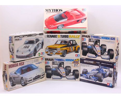 A collection of seven boxed Tamiya mixed scale Formula One Racing and Luxury Sports Car kits to include a Williams F1 Team BM