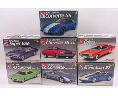 A collection of seven boxed AMT/Ertl 1/25 scale plastic vehicle kits to include a 1970 Coronet Super B Pro Street, 1969 Ford 