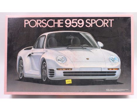 A Fujimi 10111 1/16 scale plastic kit for a Porsche 959 Sports Car (Enthusiast's Model), housed in the original card box