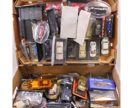 Two trays containing 1/43 scale modern issue diecast mostly mail order and other bubble plastic mounted model cars to include