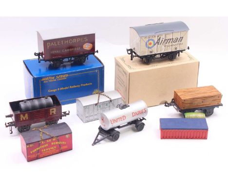 Four 0 gauge coarse scale wagons to include two by Bing, a Midland open wagon, and a wood transporting wagon, together with a