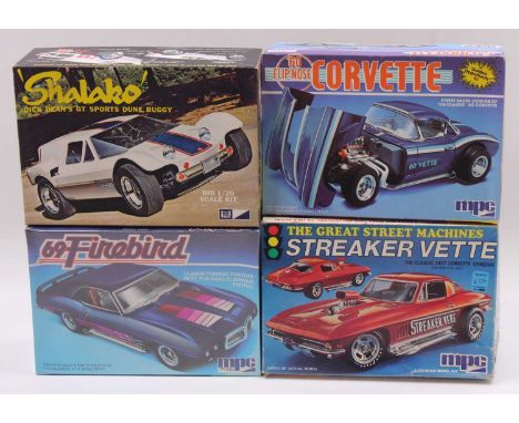 Four boxed MPC 1/20 and 1.25 scale plastic car kits to include an MPS Streaker Vette, the Classic 1967 Corvette Stingray, a F