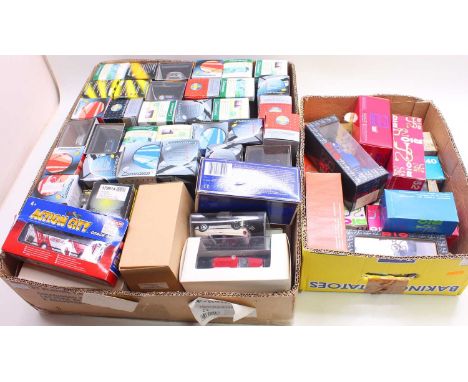 Two trays containing various modern issue diecast to include Carrera Max Toyota Yaris in 1/43 scale, a Carrera Porsche Cayenn