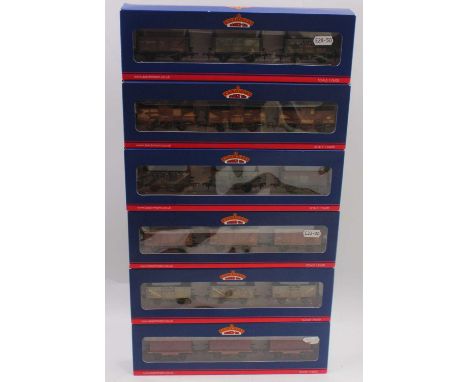 One tray containing six Bachmann 00 gauge triple wagon packs, a total of 18 wagons, all housed in original boxes to include a