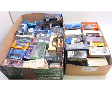 Two trays containing various 1/43 scale modern issue diecast cars, to include a Gama Mini BMW 325i coupe, a promotional Ford 