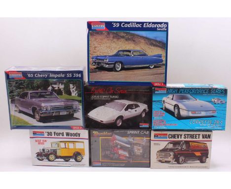 Seven boxed Monogram 1/25 scale and 1.24 scale plastic car kits ot include a 1930 Ford Woody, a 1959 Cadillac Eldorado, a Bob
