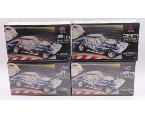 A collection of four ex-shop stock Accurate Miniatures No. 5000 1/24 scale plastic kit for a Corvette Grand Sport 1964 race c