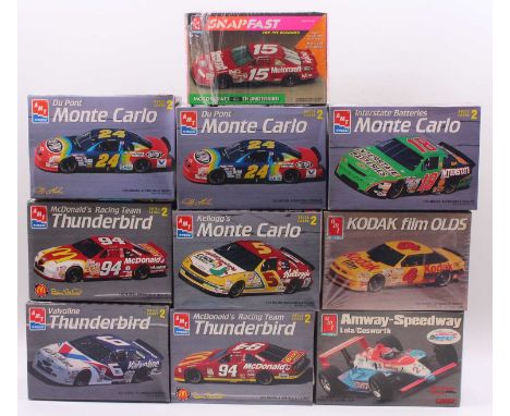 A collection of ten boxed AMT/ERTL 1/25 scale plastic stock car and high speed racing kits to include a Mcdonald's Racing Tea