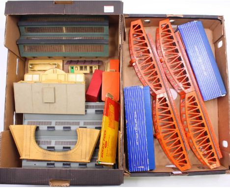 Two large trays containing Hornby-Dublo accessories: Pre-war engine shed; Super Detail 4-road engine shed; D1 main line stati