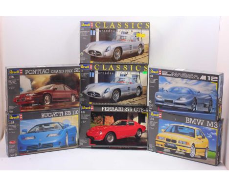 A collection of seven boxed Revell 1/24 scale plastic car kits to include a Mercedes 300SL, a Nazca M12, Pontiac Grand Prix S