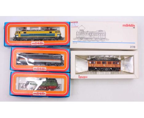 Four Marklin HO gauge locos to include a Type 16 SNCF loco, in blue and yellow, a Typ D 109, in wood panelling, from the Swed