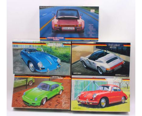 A collection of five boxed Fujimi 1/24 scale Porsche related plastic kits to include a Porsche 911 Turbo Targa, a Porsche 911