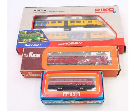 Three HO gauge locos to include a Piko Hondekop electric 2-car railcar, in yellow and blue, a Lima BR 515, in DB maroon, and 