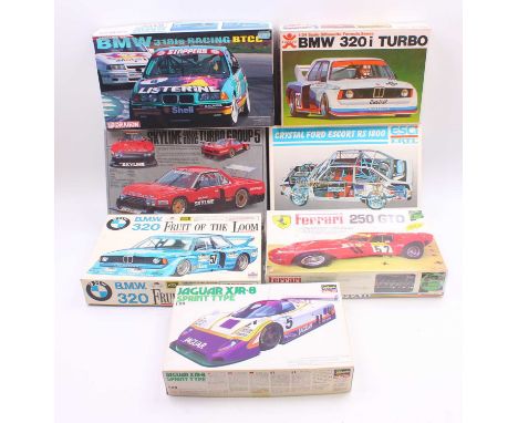 Seven mixed scale Esci Hasegawa Dragon and similar racing plastic kits to include a Gunsei Sanyo Skyline 4 valve Turbo G5, an