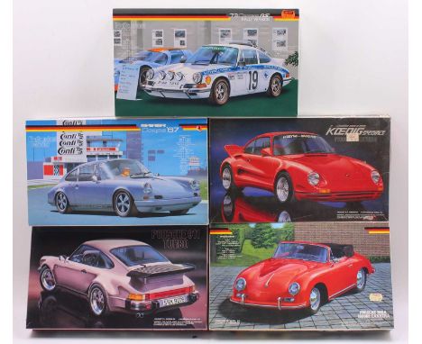 A collection of five boxed Fujimi 1/24 scale Porsche plastic kits to include a Porsche 911 Turbo, a Porsche 356A 1600 GS Carr