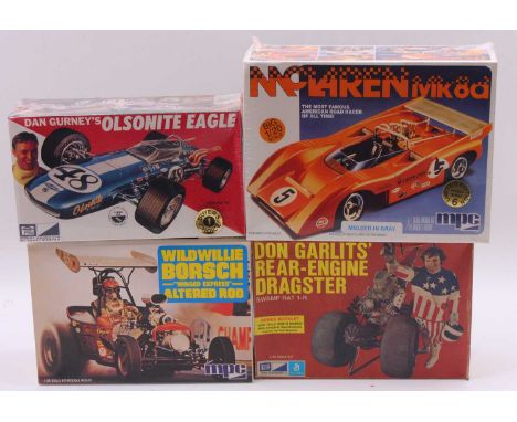 Four boxed MPC 1/20 and 1.25 scale plastic racing kits to include a Wild Willie Borsch 'Winged Express' Altered Rod, a McLare