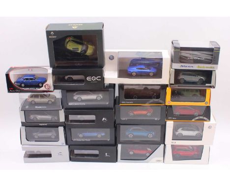 Various 1/43 scale diecast promotional cars to include a Škoda Kodiaq in red, an Audi Q2 in red, a VW ID.3 in white, a BMW 4 