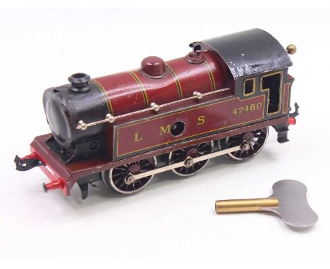 Bing 0-6-0 clockwork tank loco LMS 47480 red lined yellow &amp; black, very slight indentation to boiler around steam dome, c