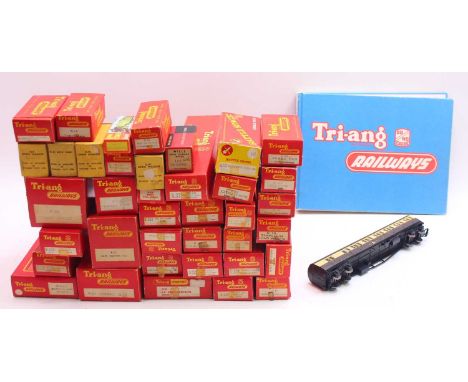 One tray containing various Triang wagons and coaches to include an R228 Pullman 1st Class, R19 Tarpaulin load wagon, R341 Se
