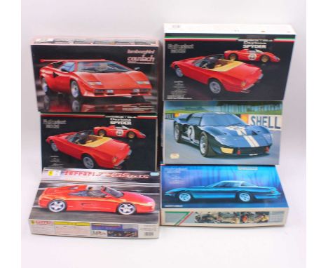 A collection of six boxed Fujimi 1/24 scale plastic vehicle kits to include a Ferrari F355 GTS, a Fujimi Ford GT40 Mk2, a 1/2