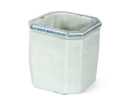 A Korean blue and white carved porcelain octagonal jardiniere, Joseon Dynasty, the four main panels carved with crane, deer, 