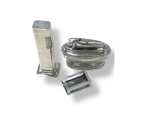 A silver plated Dunhill 'Tallboy' table cigar lighter, a Ronson silver plated table cigarette lighter and a silver matchbox c