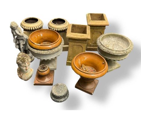 Various garden planters and ornaments, to include a pair of composite stone urns with gadrooned bodies, a pair of terrocotta 