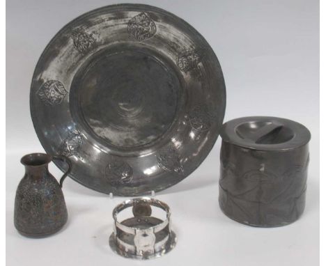 A Tudric pewter tobacco jar and cover together with a Seward electroplated glass holder, an Islamic metal plate and a similar