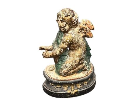 A painted cast iron door stop / andiron modelled as a cherub41cm highProvenance:Property of the late Sir Christopher McMahon