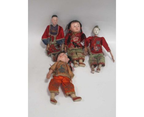 Two pairs of Chinese dolls in oriental dress, bisque heads, articulated limbs, one pair dressed in silk style tunics embroide