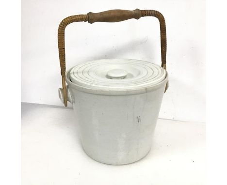 A ceramic lidded slop pail with cane and wooden handle (24cm not including handle x 32cm)