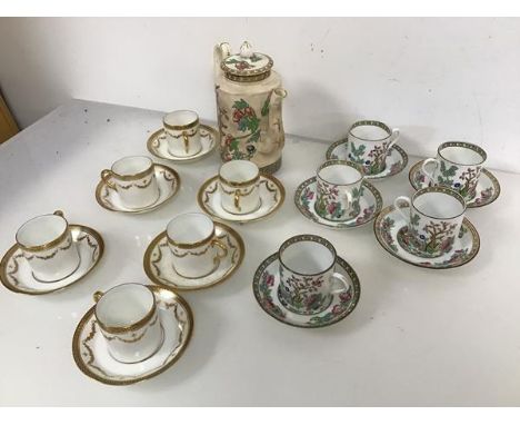 A set of six Paragon china coffee cans and saucers, a set of five Anchor china coffee cans and saucers in India Tree pattern 