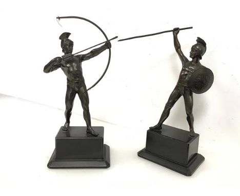 A pair of spelter Classical warrior figures, one with bow and arrow, the other spear and shield, both on plinth base (h.23cm)